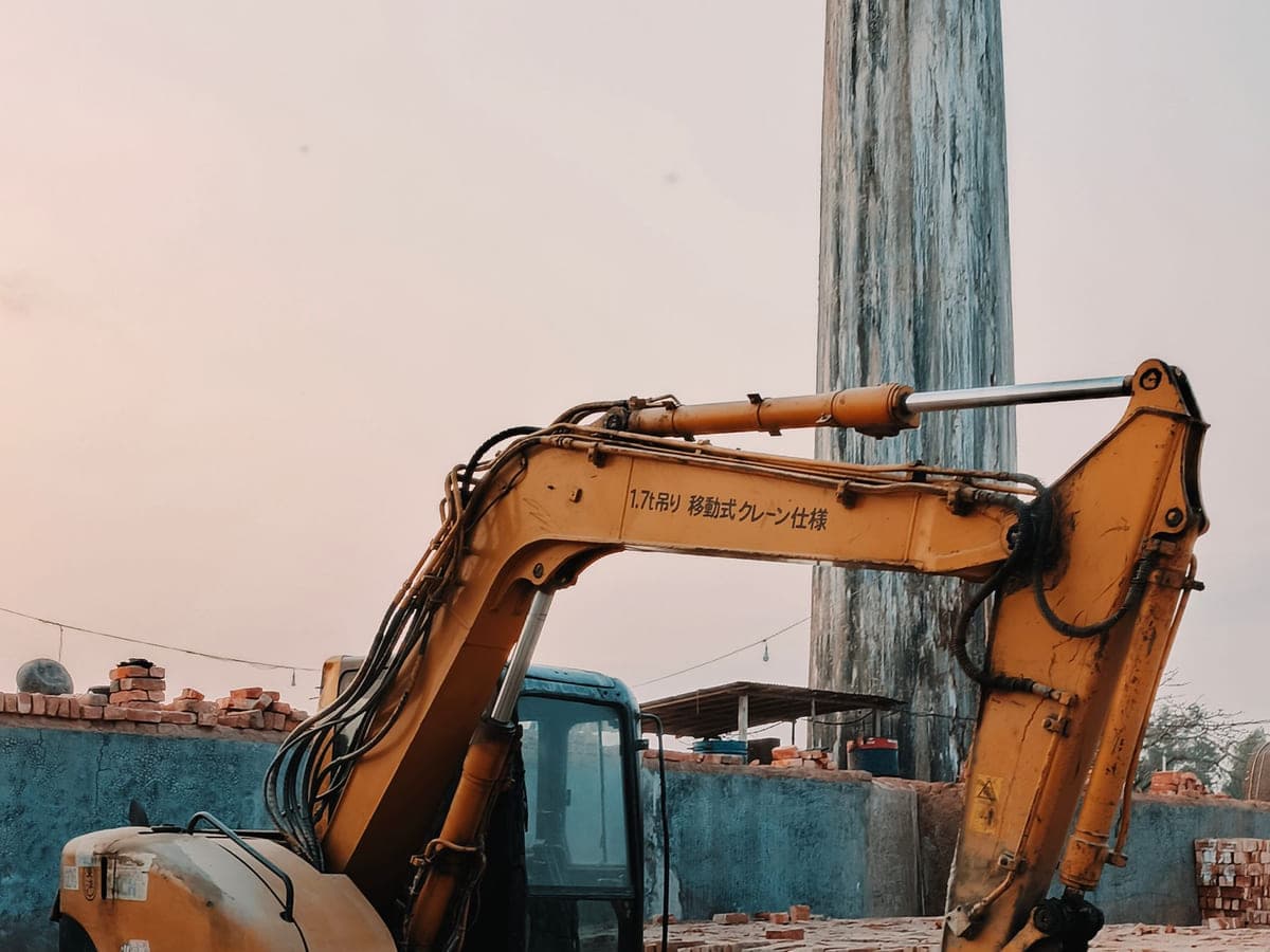 Tracked excavator working on an active construction site